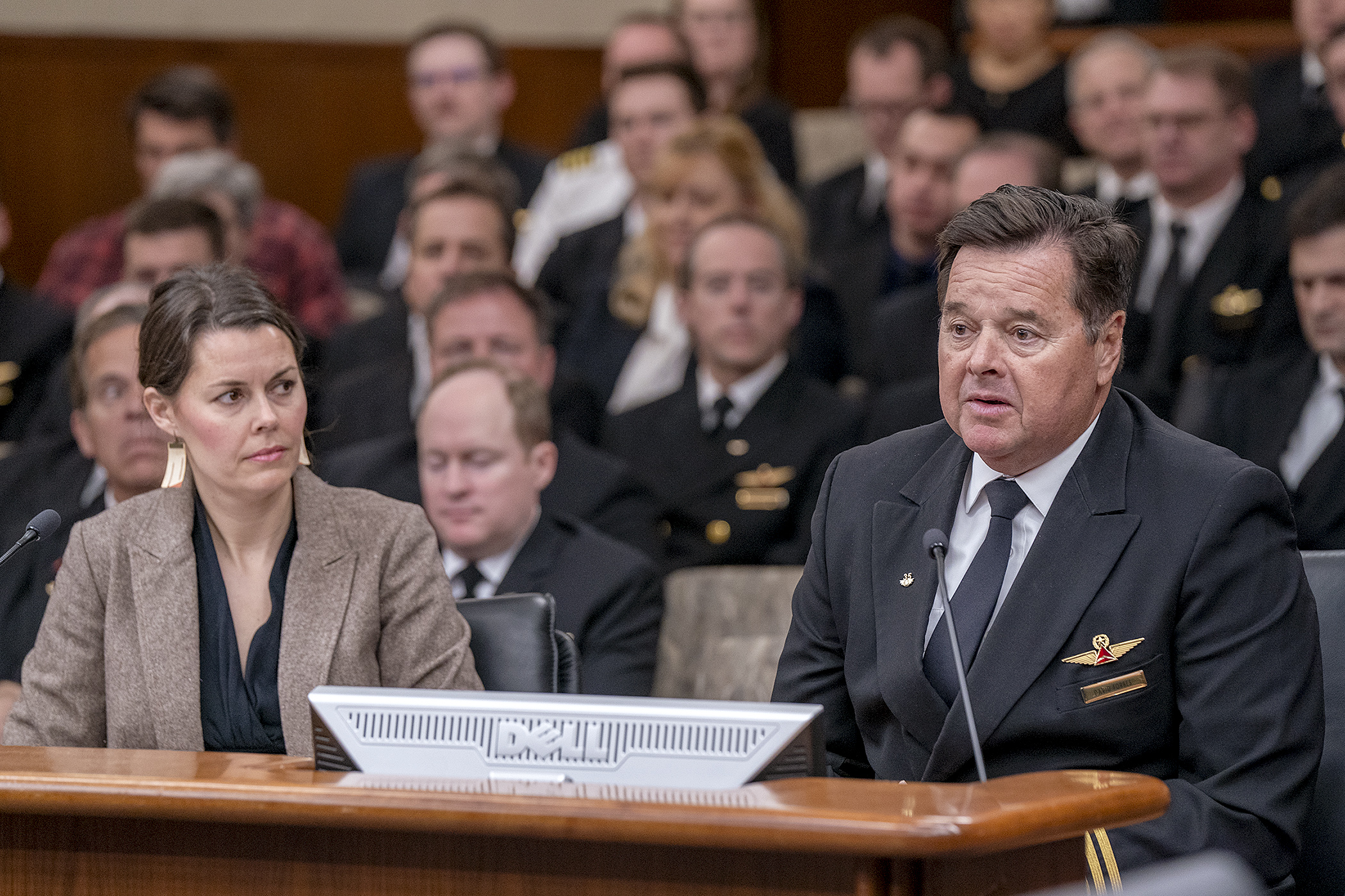Delta Airlines Capt. David Forbes testifies Feb. 22 before the House labor committee on HF3882. It would allow airline flight attendants and pilots to receive earned sick and safe time benefits. Rep. Liz Olson is the sponsor. (Photo by Michele Jokinen)